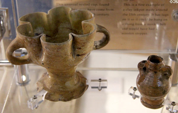 Ceramic sexfoil cup (14thC) & ink pot (15thC) at Arbroath Abbey. Arbroath, Scotland.