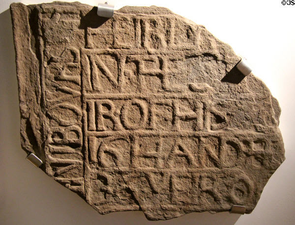 Stone tombstone fragment (1614) with text at Arbroath Abbey. Arbroath, Scotland.