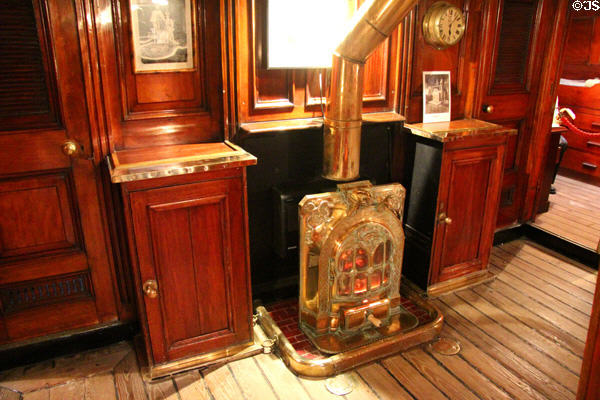 Stove & sideboards in officer's mess aboard RRS Discovery. Dundee, Scotland.