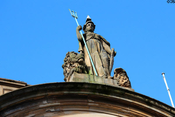 Statue of Britannia & lion by James Charles Young atop former Clydesdale Bank (96 High St.). Dundee, Scotland.