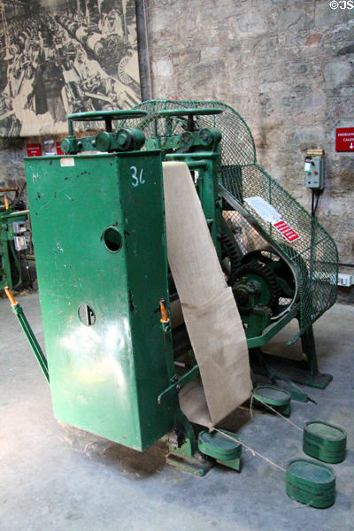 Jute finishing machine to give jute linen a smooth & pressed finish at Verdant Works Museum. Dundee, Scotland.