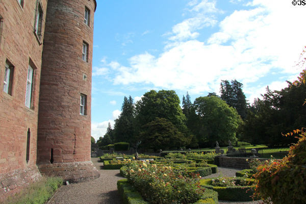 Rose garden beside tower at Glamis Castle. Angus, Scotland.