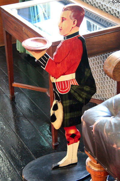 Kilted flat figure with tray in billiard room / library at Glamis Castle. Angus, Scotland.