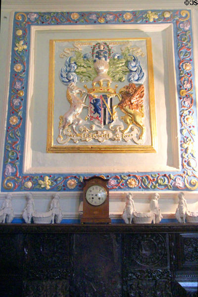 Painted family crest over fireplace in Malcolm's room at Glamis Castle. Angus, Scotland.