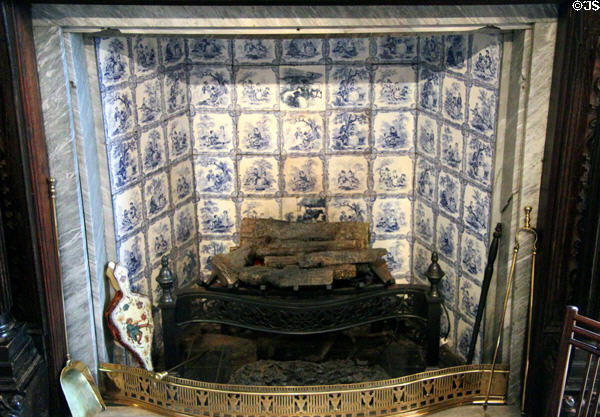 Fireplace delft tiles in royal sitting area at Glamis Castle. Angus, Scotland.