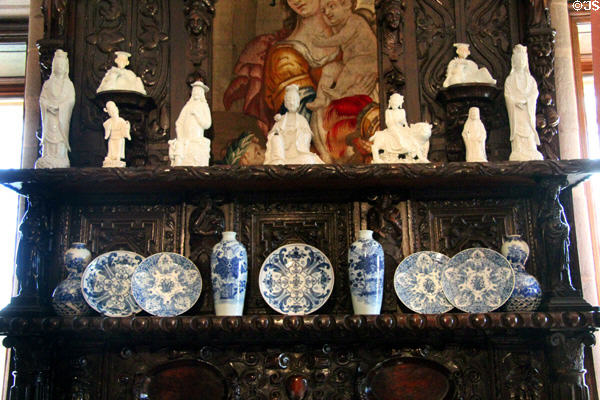 Porcelain figures & plates on fireplace mantle in Queen Mother sitting area at Glamis Castle. Angus, Scotland.