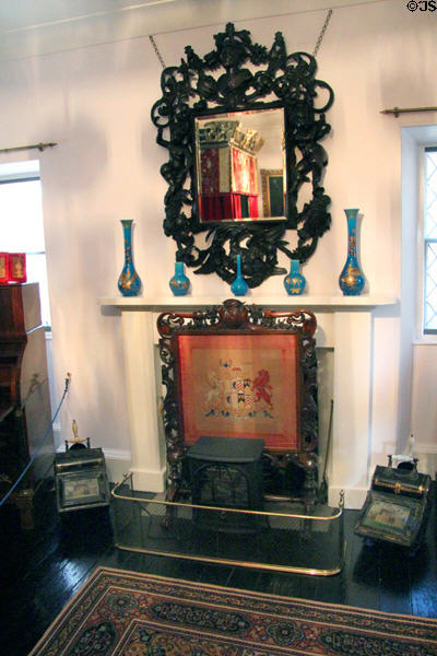 Fireplace with carved mirror & screen in king's bedroom at Glamis Castle. Angus, Scotland.