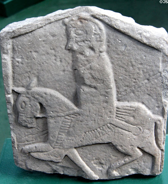 Pictish grave stone (back of #3) with rider on striped saddlecloth with sword at Meigle Sculptured Stone Museum. Meigle, Scotland.