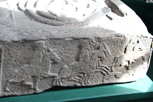 Pictish graveslab (#26) edge detail of hunting scene at Meigle Sculptured Stone Museum. Meigle, Scotland.