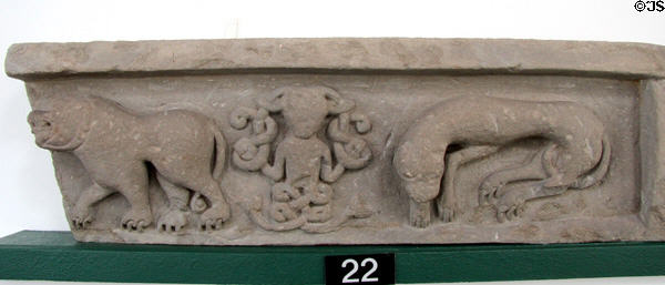 Pictish architectural frieze (#22) with two clawed beasts flanking half-woman / half-fish siren at Meigle Sculptured Stone Museum. Meigle, Scotland.