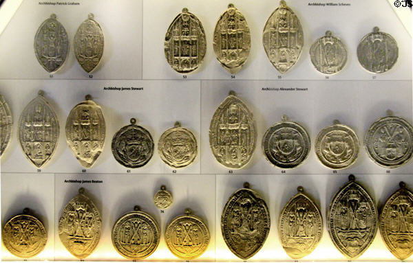Collection of casts of seals of Archbishops of St Andrews in museum at St Andrews Cathedral. St Andrews, Scotland.