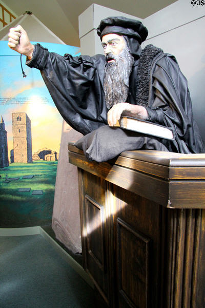 Sculpture shows John Knox preaching at St Andrews during Scottish Reformation at St Andrews Castle. St Andrews, Scotland.
