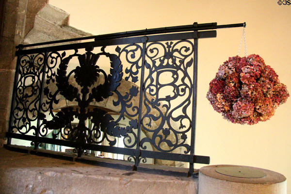 Wrought iron stair railing with thistle at Falkland Palace. Falkland, Scotland.