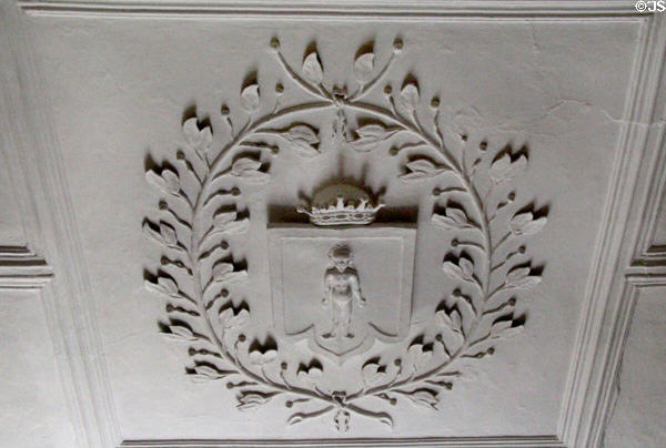 Heraldic panel framed by laurel leaves commemorates marriage of 3red Earl of Kellie to Mary Dalzell in 1676 on ceiling in drawing room at Kellie Castle. Pittenweem, Scotland.