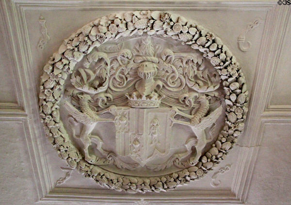 Heraldic panel framed by fruit commemorates marriage of 3red Earl of Kellie to Mary Dalzell in 1676 on ceiling in drawing room at Kellie Castle. Pittenweem, Scotland.