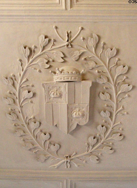 Heraldic panel framed by laurel leaves commemorates marriage of 3red Earl of Kellie to Mary Dalzell in 1676 on ceiling in drawing room at Kellie Castle. Pittenweem, Scotland.