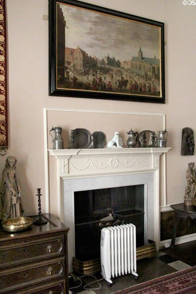 Dining room fireplace with painting of market place in Amersfoort at Kellie Castle. Pittenweem, Scotland.