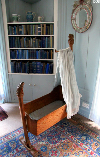 Cradle in blue bedroom at Kellie Castle. Pittenweem, Scotland.