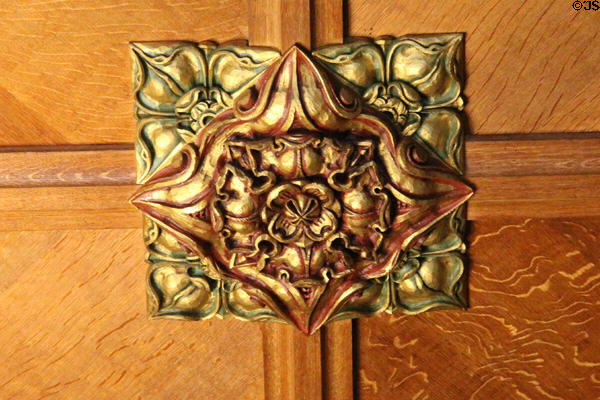 Carved flower plaque on wood panel in the Hall at Hill of Tarvit Mansion. Cupar, Scotland.