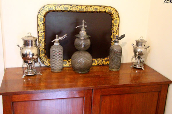 Sideboard with tea urns, seltzer bottles & coffee percolator (in center) before enameled tray at Hill of Tarvit Mansion. Cupar, Scotland.