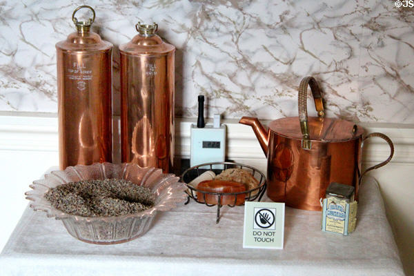 Copper Shirley�s Hecla style hot water bottles bed warmer with filling canister at Hill of Tarvit Mansion. Cupar, Scotland.