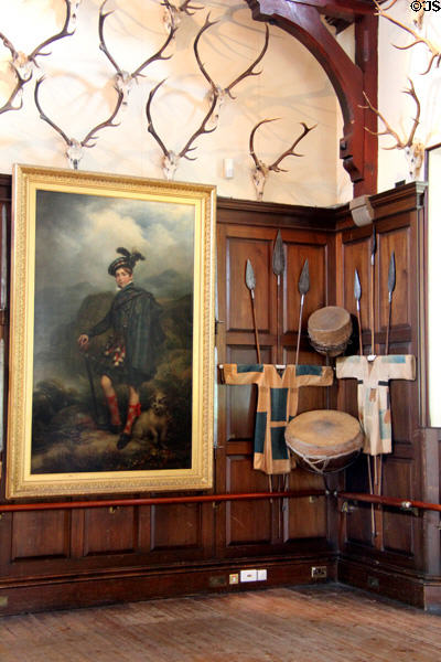 Clan portrait surrounded by weapons in Ballroom at Blair Castle. Pitlochry, Scotland.