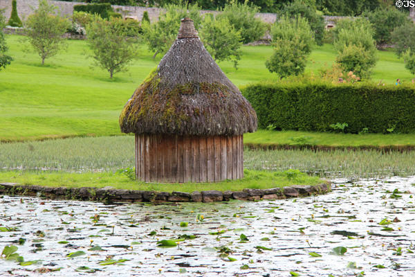 Traditional Scottish hut on garden lake at Blair Castle. Pitlochry, Scotland.