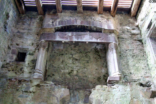 Fireplace suspended after floors collapsed at Cardoness Castle. Scotland.