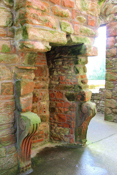 Sculpted fireplace in Nithsdale Lodging at Caerlaverock Castle. Caerlaverock, Scotland.