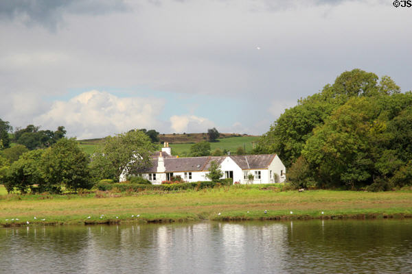 House on bank of River Dee. Kirkcudbright, Scotland.
