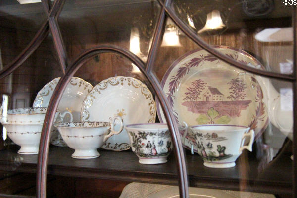 China collection in cabinet at Broughton House. Kirkcudbright, Scotland.
