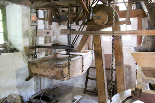 Milling machinery at New Abbey Corn Mill. New Abbey, Scotland.