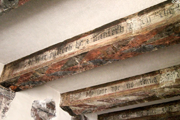 Painted ceiling beams with biblical text in stair chamber at Crathes Castle. Crathes, Scotland.