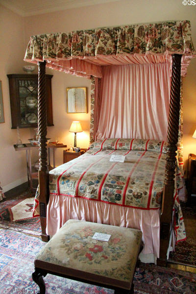 Victorian bedroom with four-poster bed & quilt (1878) made by Lady Burnett at Crathes Castle. Crathes, Scotland.