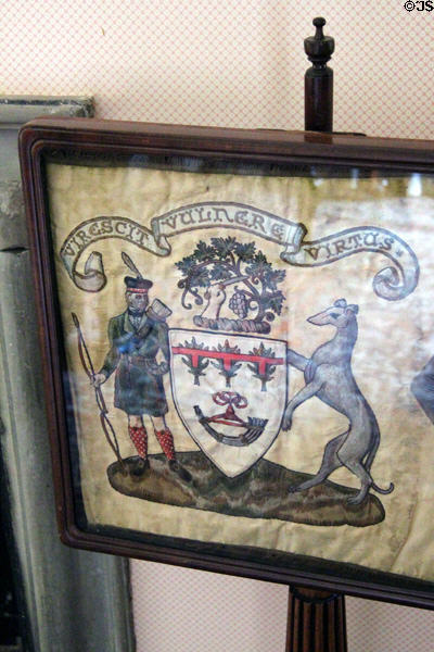 Fire screen with Scottish design in Victorian bedroom at Crathes Castle. Crathes, Scotland.