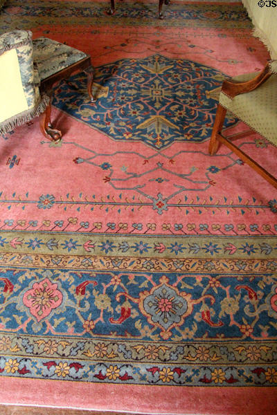 Pink & blue Turkish oriental carpet (c1860) in drawing room at Drum Castle. Drumoak, Scotland.