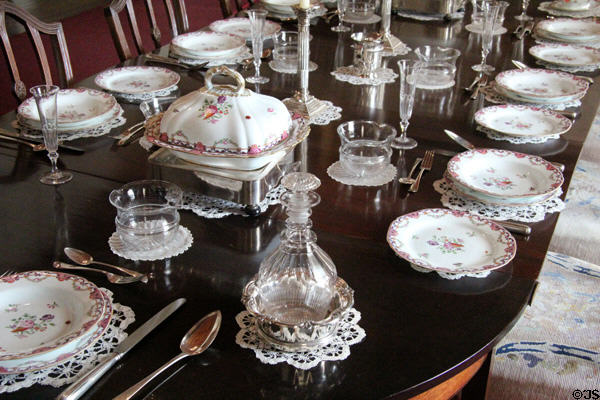 Porcelain table service & wine decanter in dining room at Drum Castle. Drumoak, Scotland.