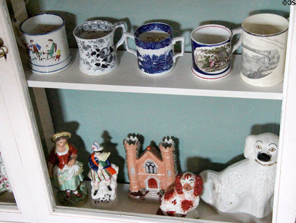 Ceramic cups & figurines in China Room at Castle Fraser. Aberdeenshire, Scotland.