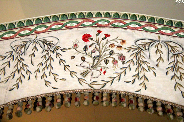 Embroidered flowers on bed canopy in Worked Room at Castle Fraser. Aberdeenshire, Scotland.