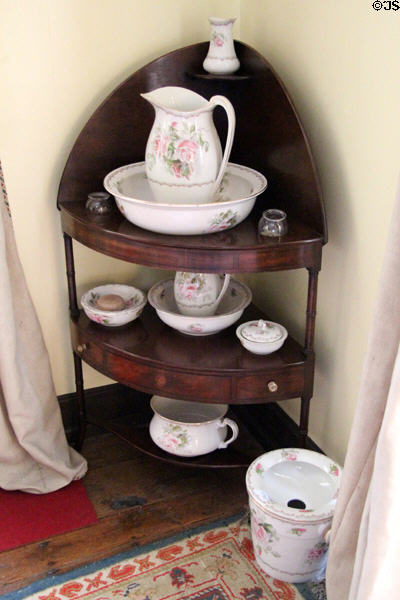 Washstand with pitchers & basins in Worked Room at Castle Fraser. Aberdeenshire, Scotland.