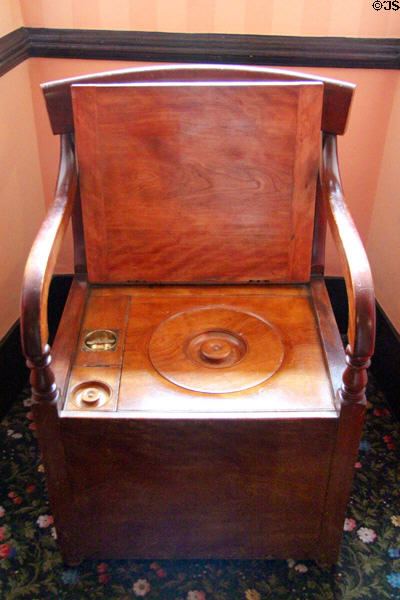 Flush commode chair (19thC) which not plumbed but emptied by servants at Castle Fraser. Aberdeenshire, Scotland.