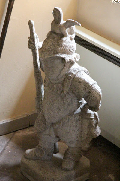 Sculpted armoured soldier with long gun at Fyvie Castle. Turriff, Scotland.
