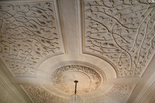 Sculpted plaster ceiling with branches & fruit (1683) in morning room at Fyvie Castle. Turriff, Scotland.