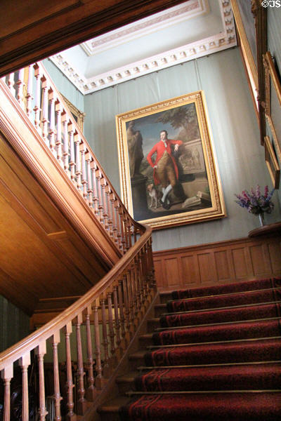 Entrance hall staircase (1881) with Lord Haddo painting at Haddo House. Methlick, Scotland.
