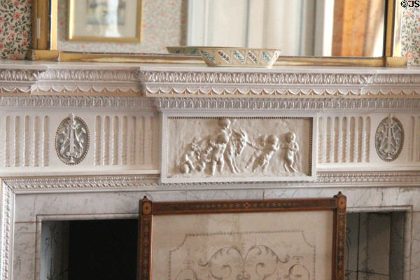 Adamesque bedroom fireplace mantle with panel of cherubs leading donkey at Haddo House. Methlick, Scotland.