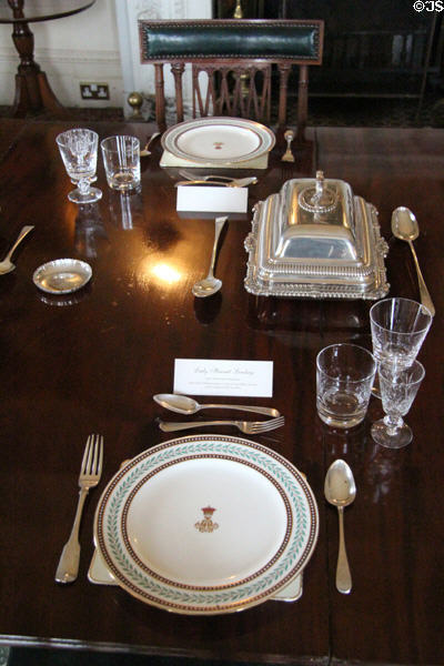 Dining room place setting with covered silver serving dish at Haddo House. Methlick, Scotland.