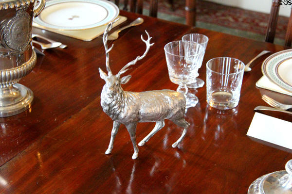 Silver stag statuette on dining room table at Haddo House. Methlick, Scotland.