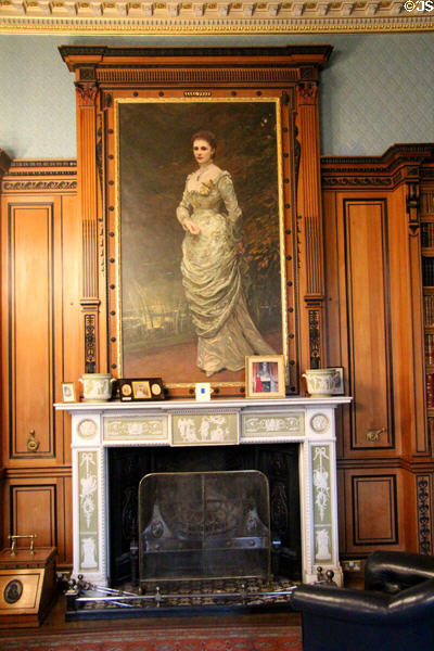 Portrait of Countess of Aberdeen, wife of governor general of Canada (1893-8) over Adamesque fireplace in library at Haddo House. Methlick, Scotland.