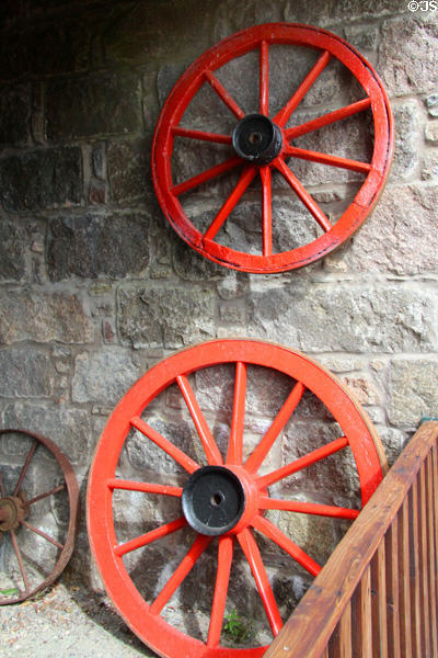 Wagon wheels in Museum of Farming Life at Pitmedden Garden. Pitmedden, Scotland.