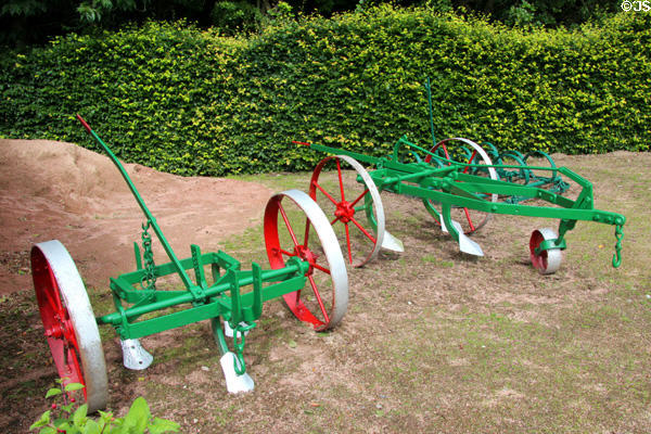 Ploughs in Museum of Farming Life at Pitmedden Garden. Pitmedden, Scotland.